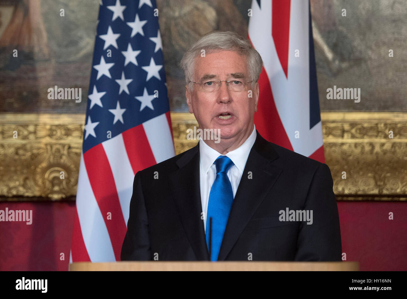 Defence Secretary Sir Michael Fallon and US Defence Secretary James Mattis (not in picture) during a joint press conference at Lancaster House in London. Stock Photo