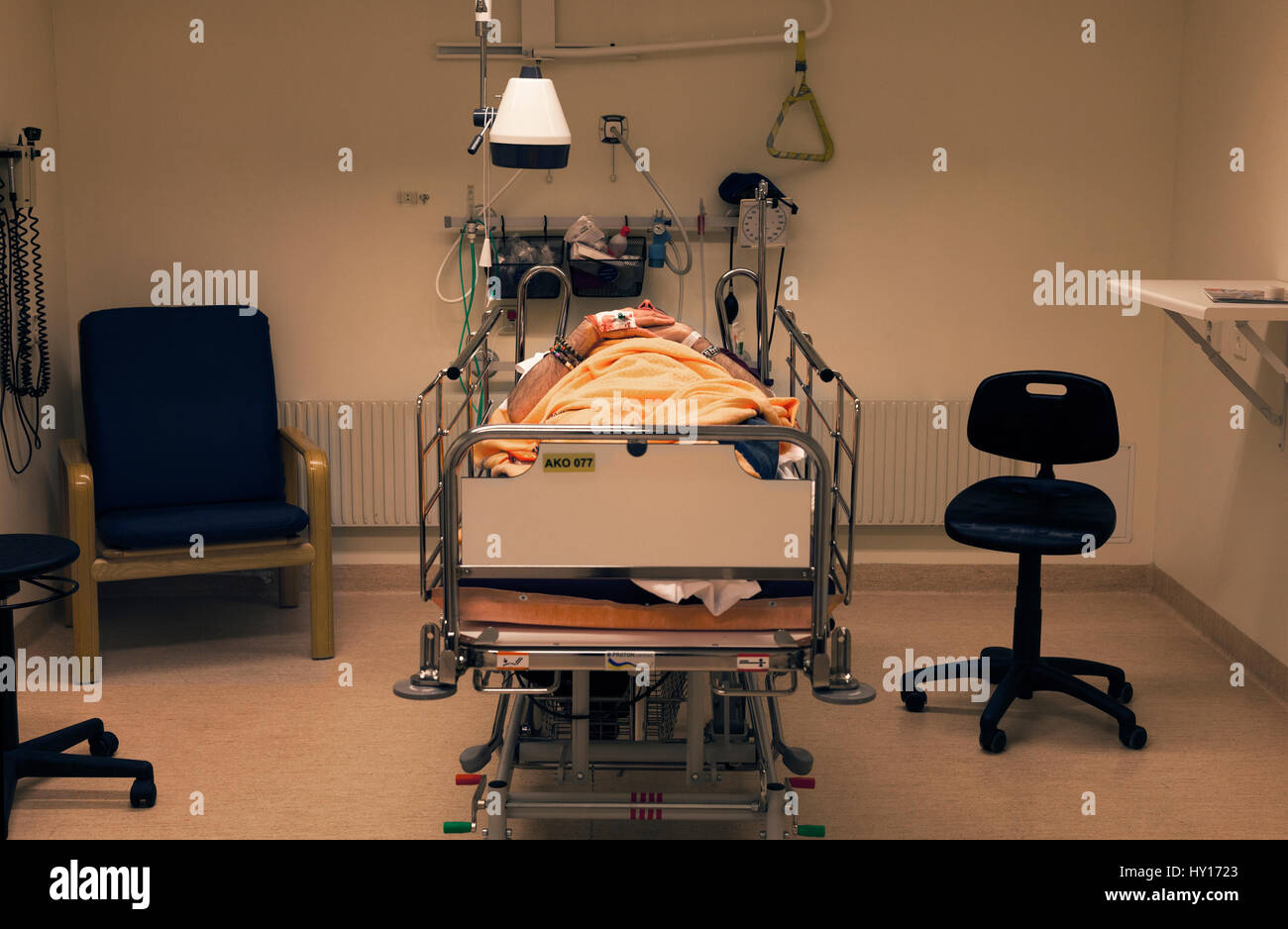 Hospital bed man lying hi-res stock photography and images - Alamy