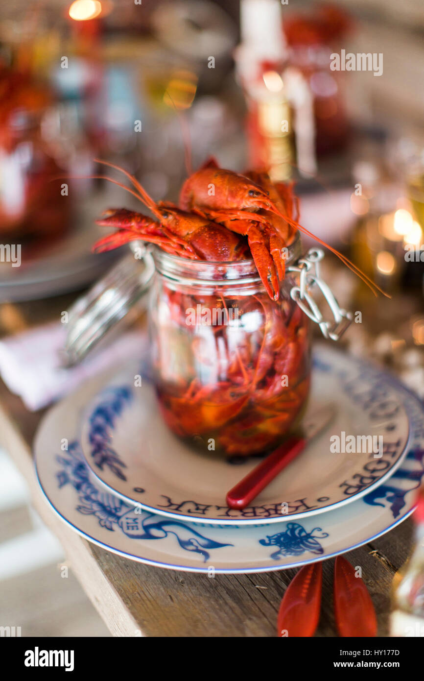 Sweden, Jar with fresh crayfish Stock Photo
