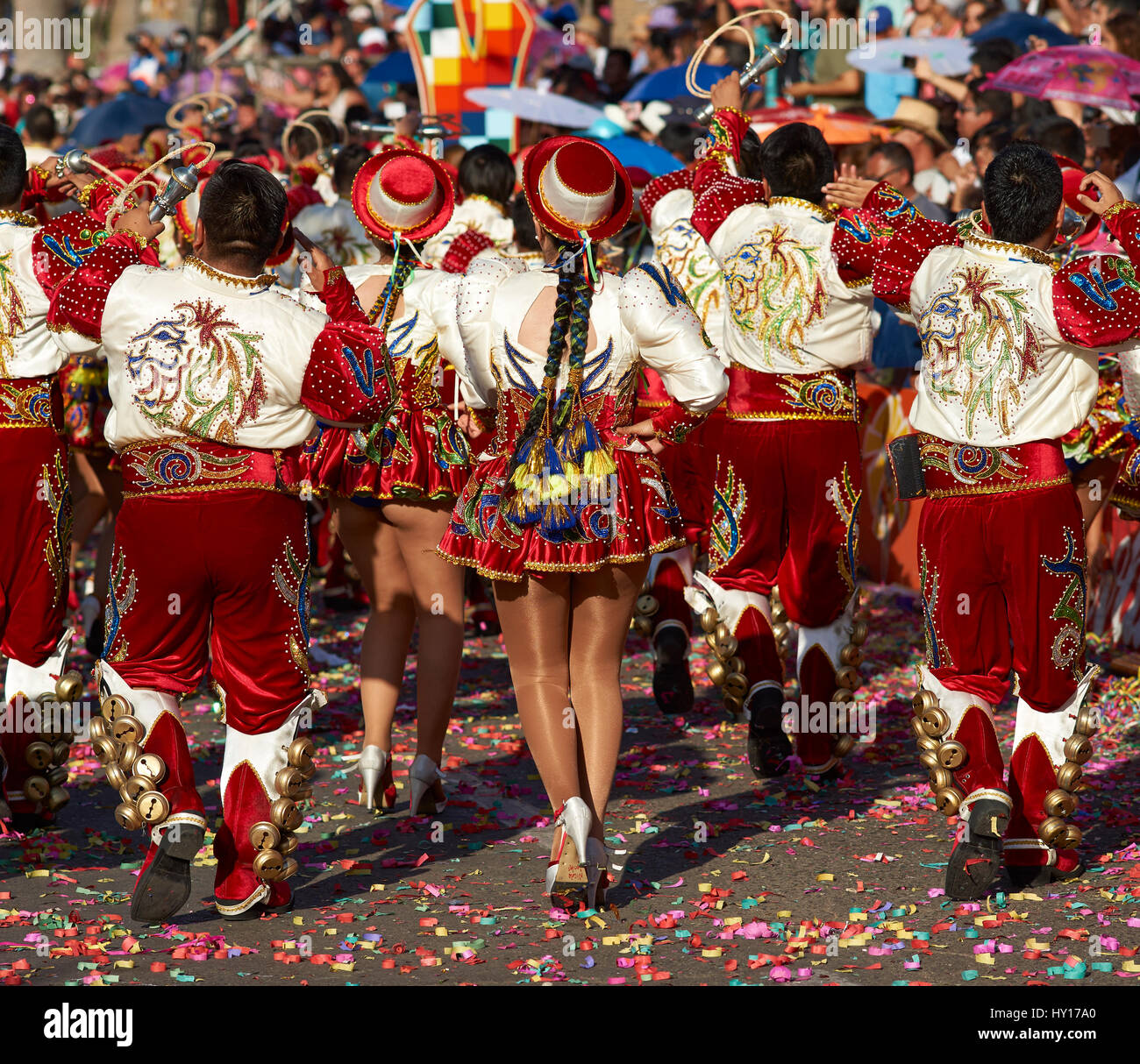 Caporales Dance Group In Ornate Red And White Costume Performing At The Annual Carnaval Andino