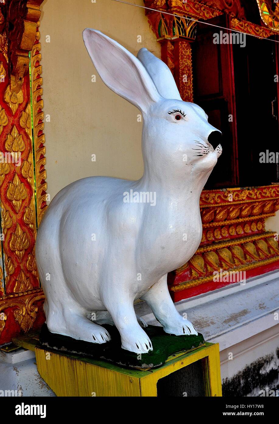 Lamphun, Thailand - December 28, 2012:  Carved figure of a giant white rabbit stands outside the Ubosot sanctuary hall at Wat Doi Ti Stock Photo