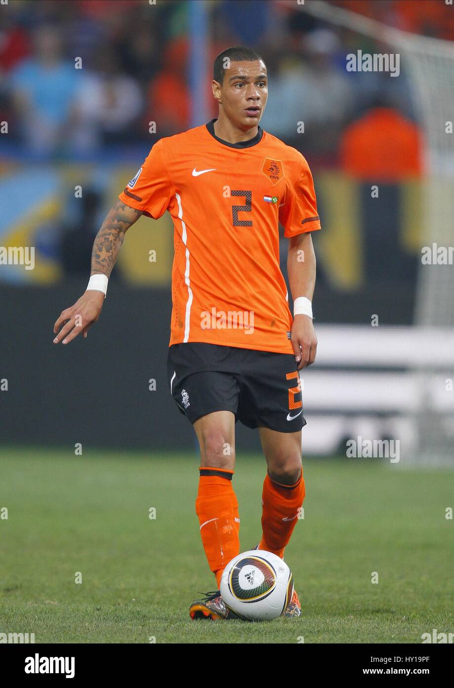 Gregory van der Wiel of the Netherlands eyes the ball during a