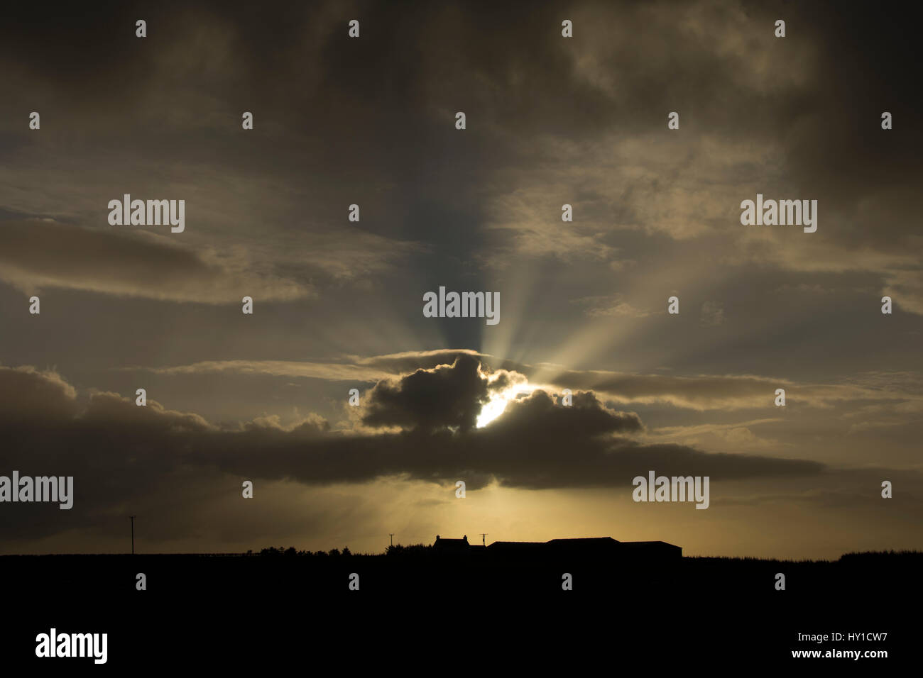 Clouds and sunbeams at Scarfskerry, Caithness, Scotland, UK Stock Photo