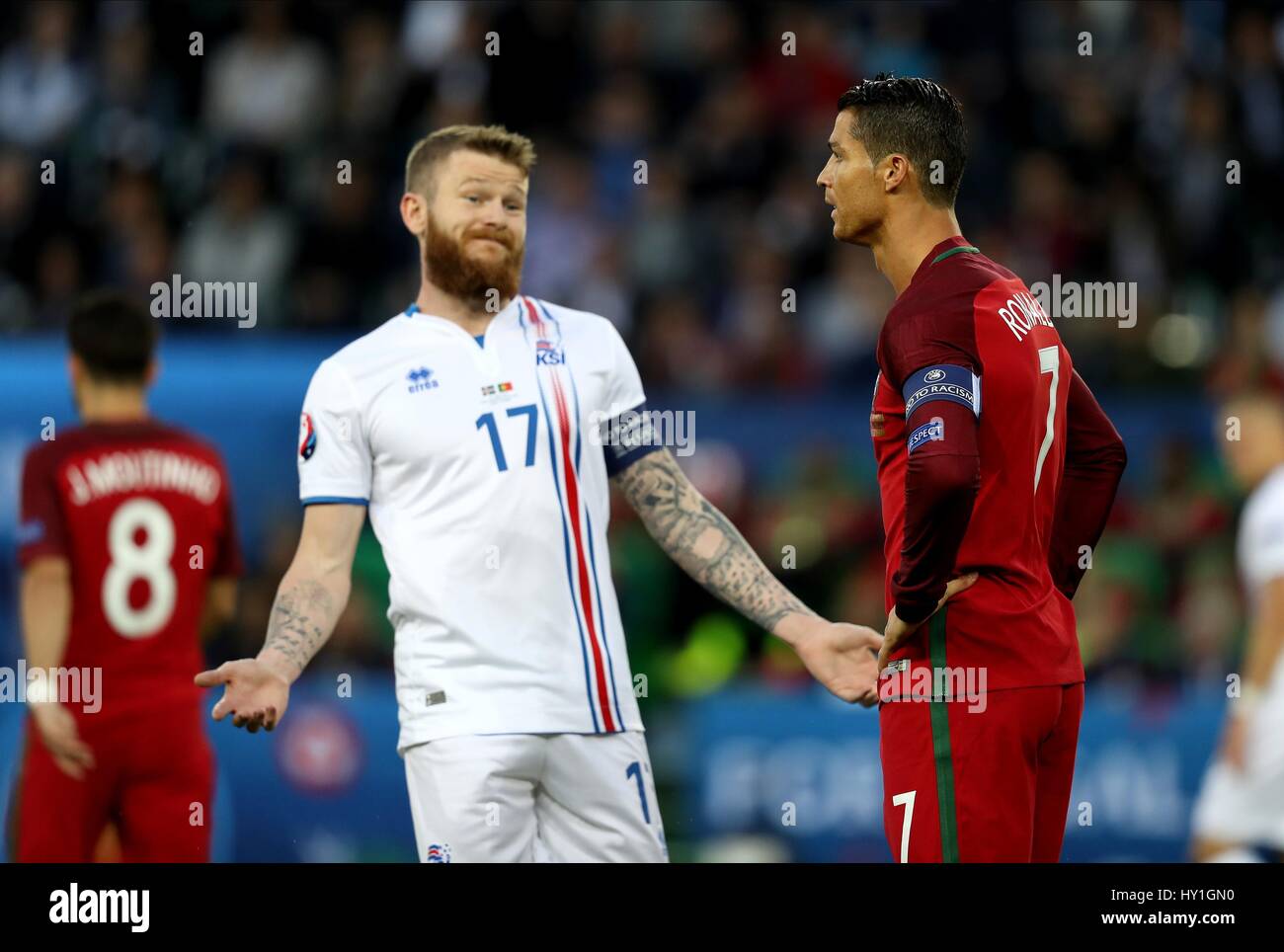 ARON GUNNARSSON AND CRISTIANO PORTUGAL V ICELAND STADE GEOFFROY-GUICHARD SAINT-ETIENNE FRANCE 14 June 2016 Stock Photo