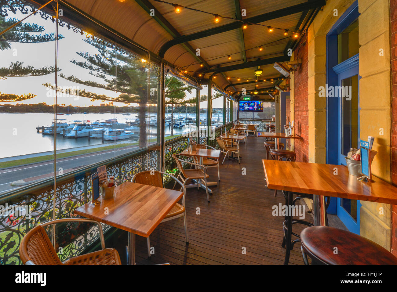 View from the balcony of a typical early 1900's pub, overlooking a marina on the Swan River, Fremantle, Perth, Western Australia. Stock Photo