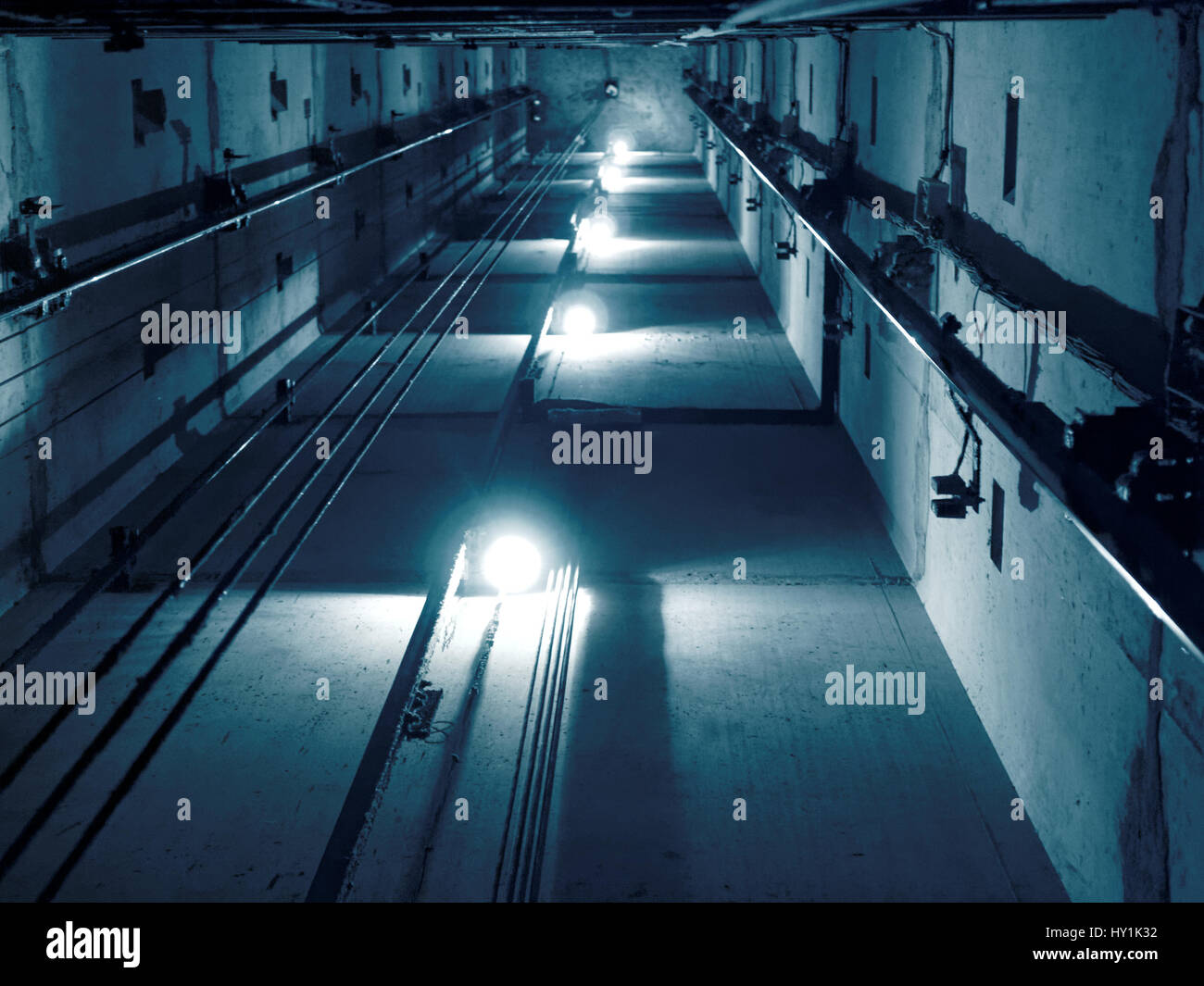 Elevator shaft in blue light Stock Photo