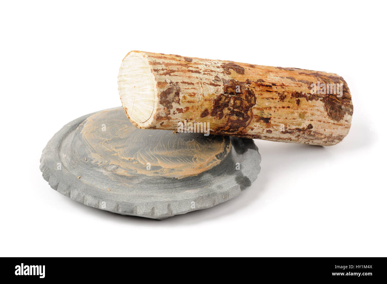 Thanaka wood and Kyauk pyin stone slab isolated on white background Stock Photo