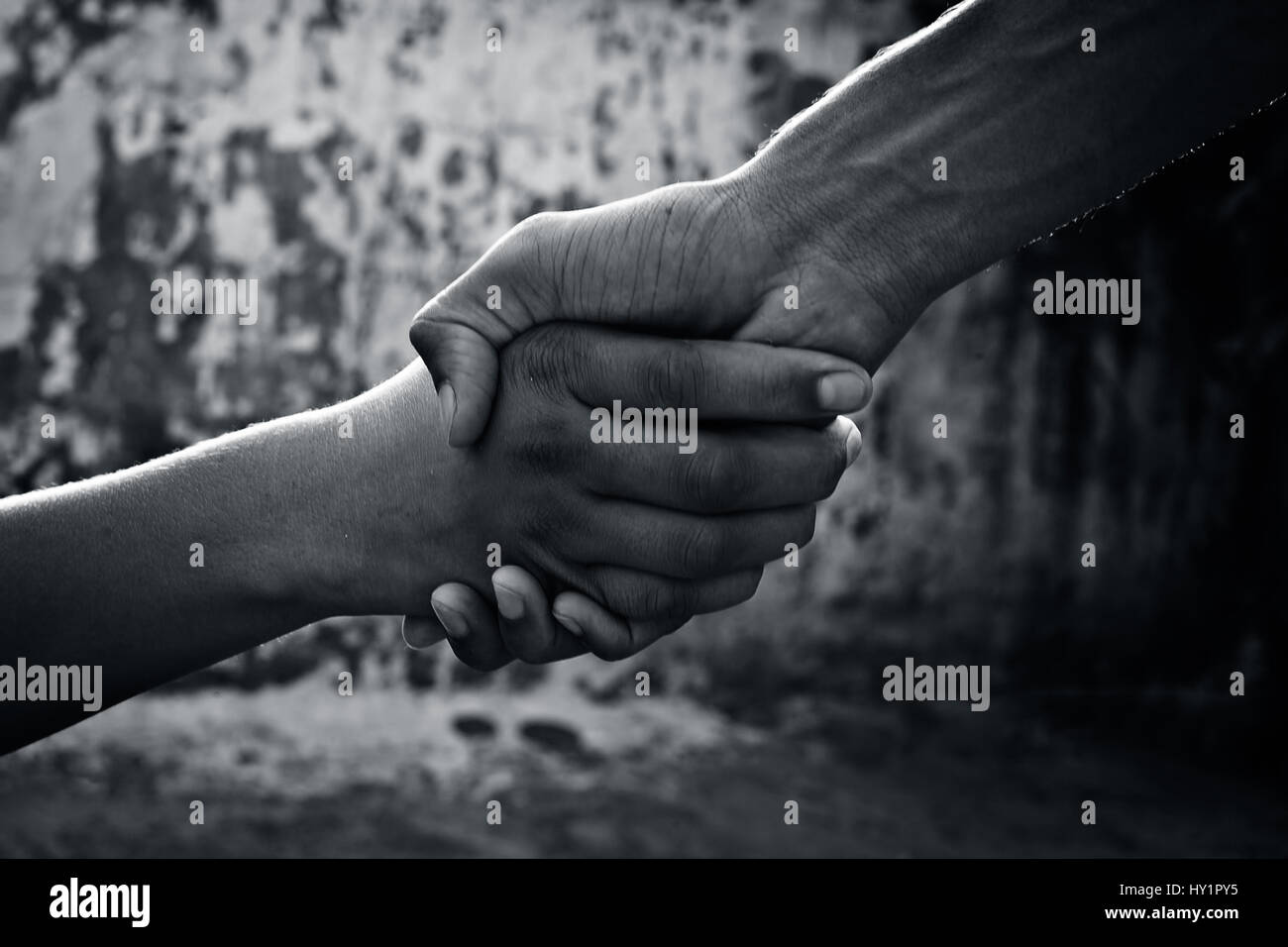 Team work. Human hands joined together Stock Photo - Alamy