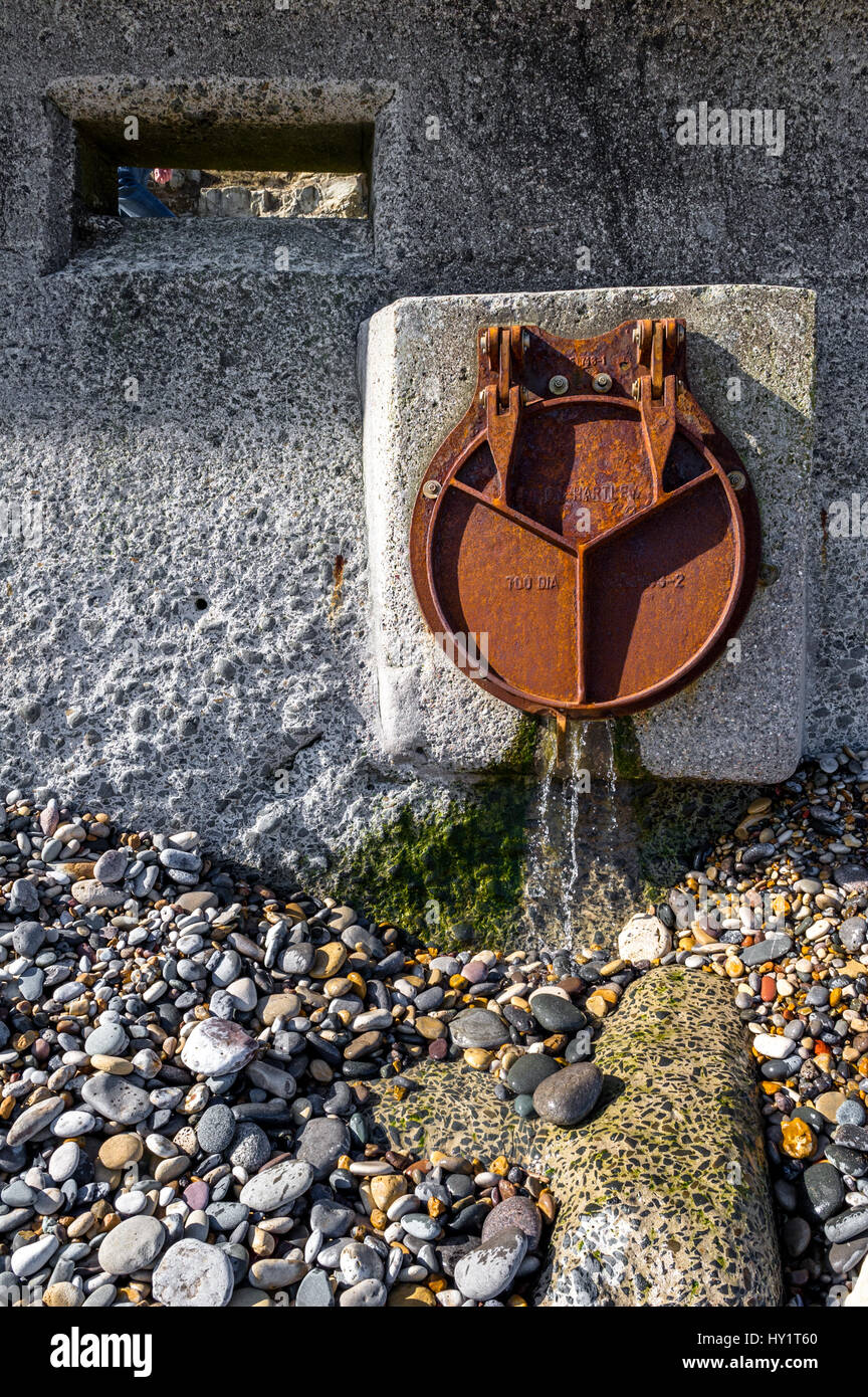 Steel land drainage outlet at the sea defence wall, Seaham, County