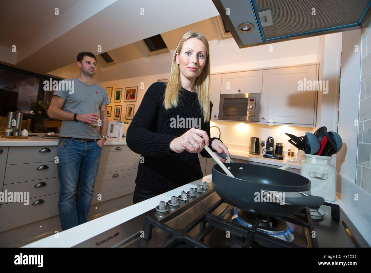 British family using gas utility at home Stock Photo