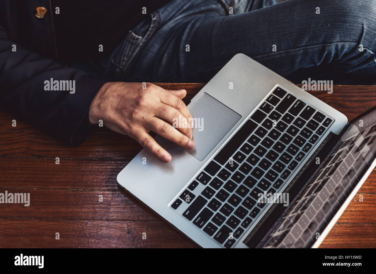 Just a man with his laptop on table. Stock Photo
