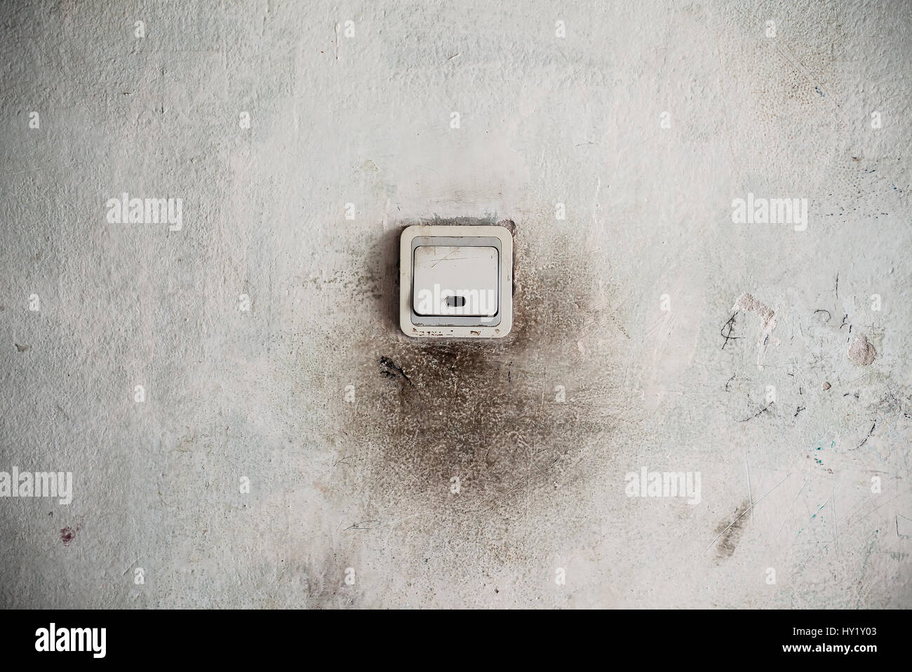 Old dirty plastic light switch and damaged wall Stock Photo Alamy