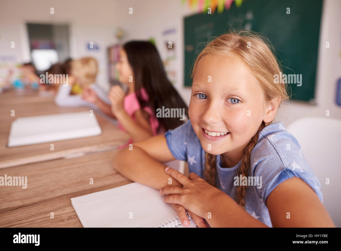Portrait of smiling elementary school girl Stock Photo Alamy