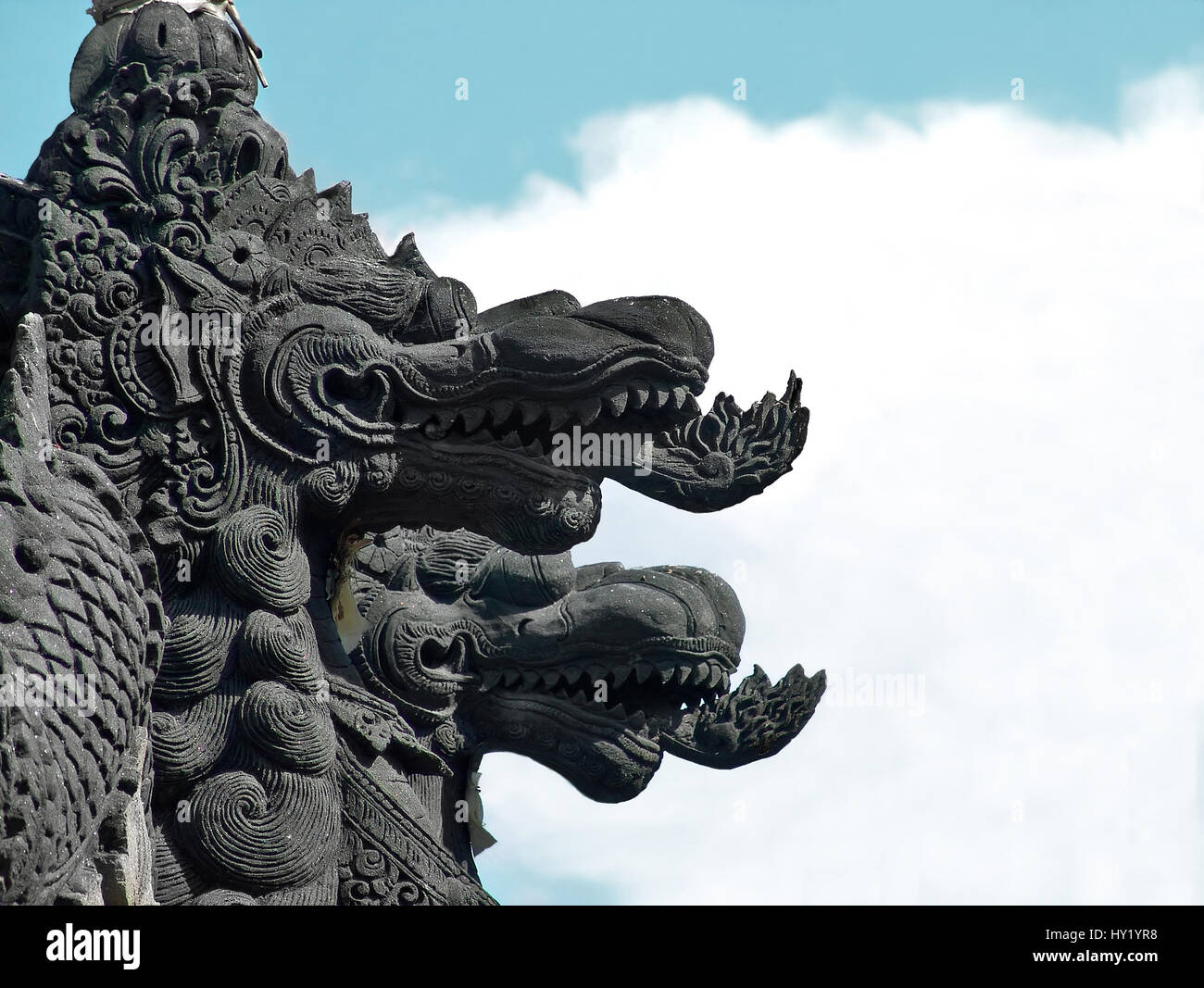 Image of ancient dragon statues at the Tanah Lot Temple in Bali, Indonesia. Stock Photo