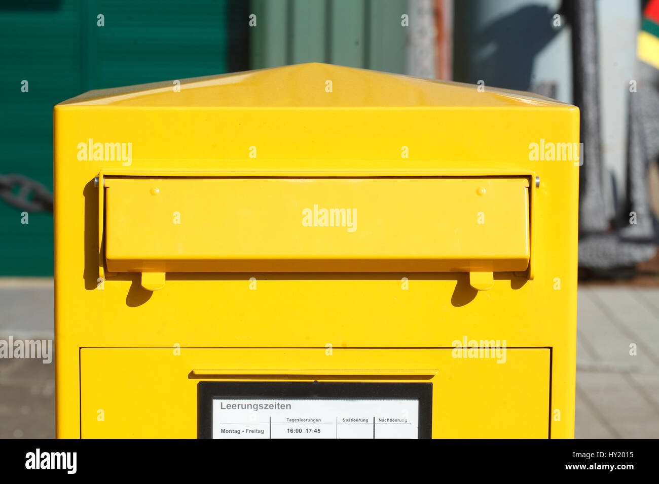 Yellow Letterbox with mail slot Stock Photo Alamy