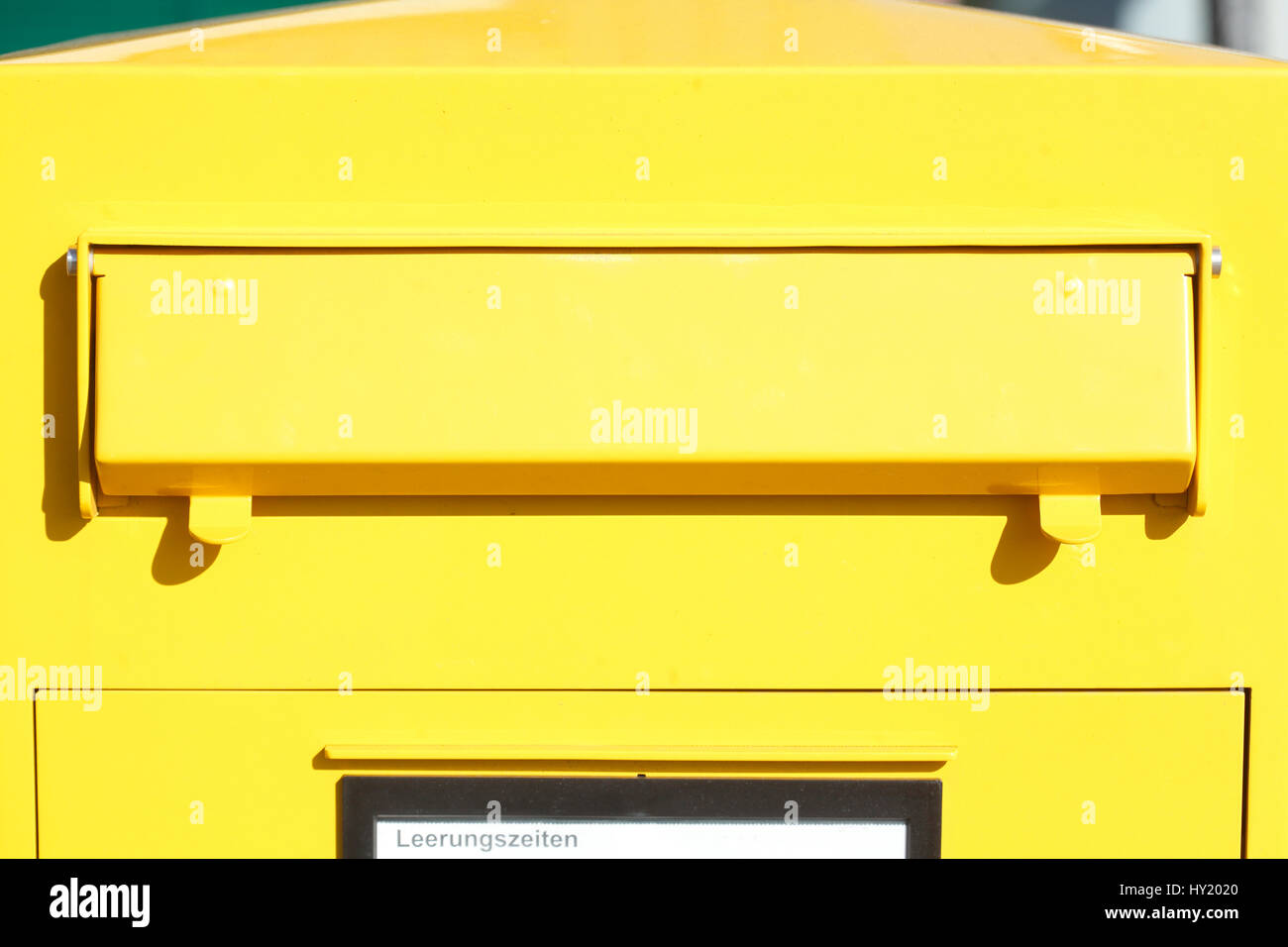 Yellow Letterbox with mail slot Stock Photo Alamy
