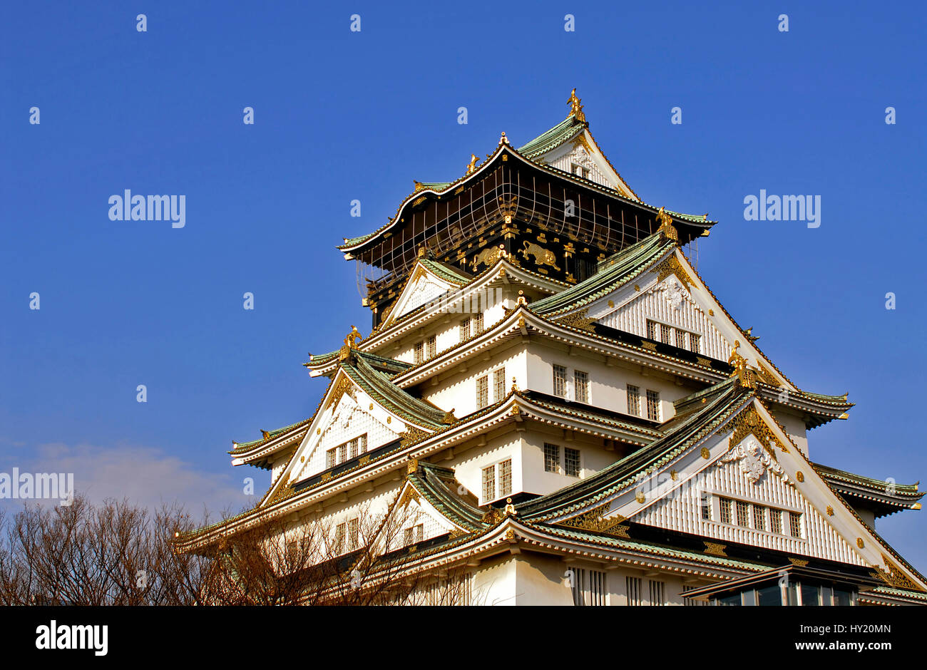 Image of the main tower of the Osaka Castle; originally called Ozakajo, it is one of Japan's most famous castles. The Castle grounds contain thirteen  Stock Photo