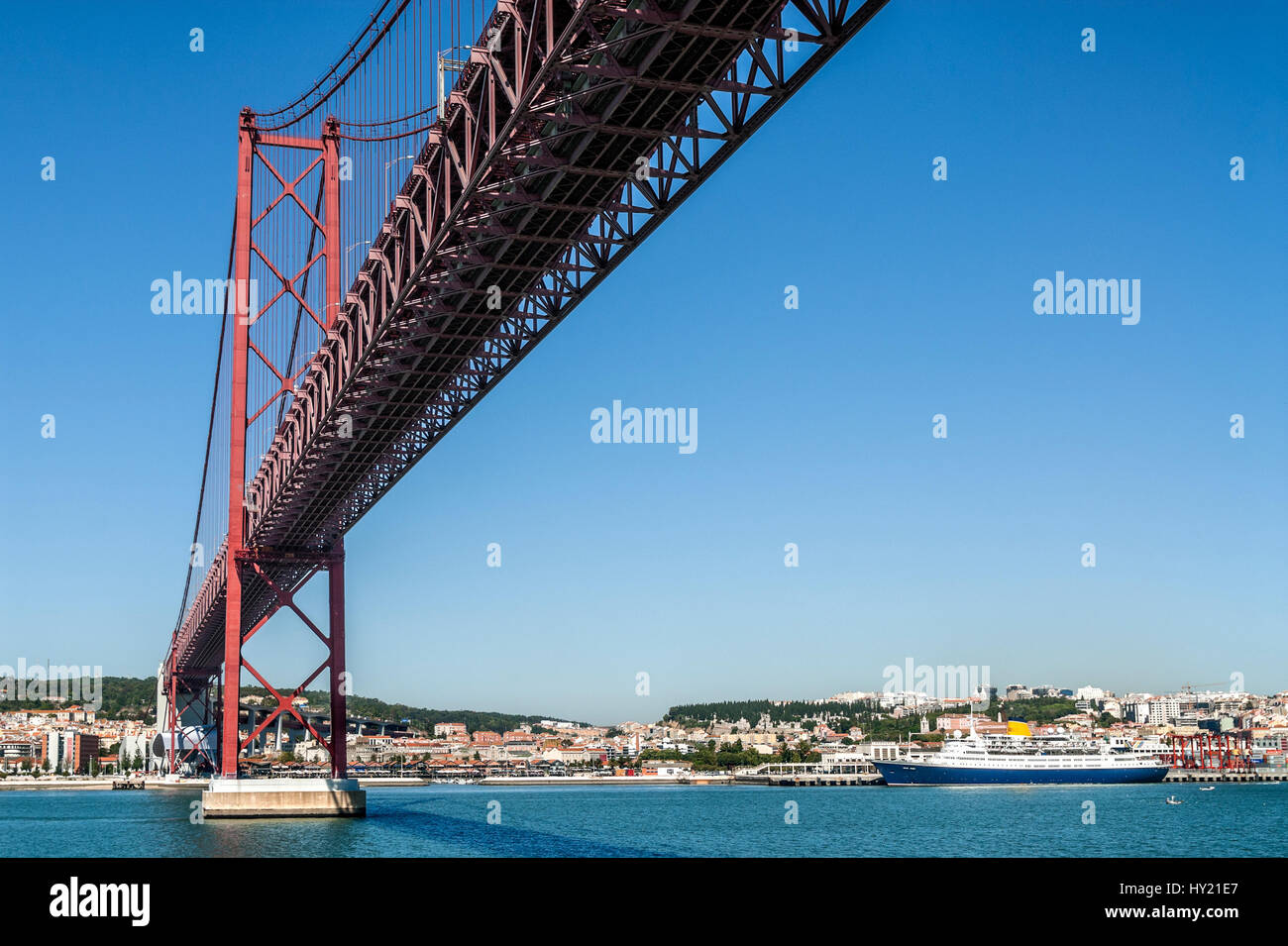 Suspension bridge Ponte 25 de Abril accross the River Tejo, Lisbon; Portugal Stock Photo
