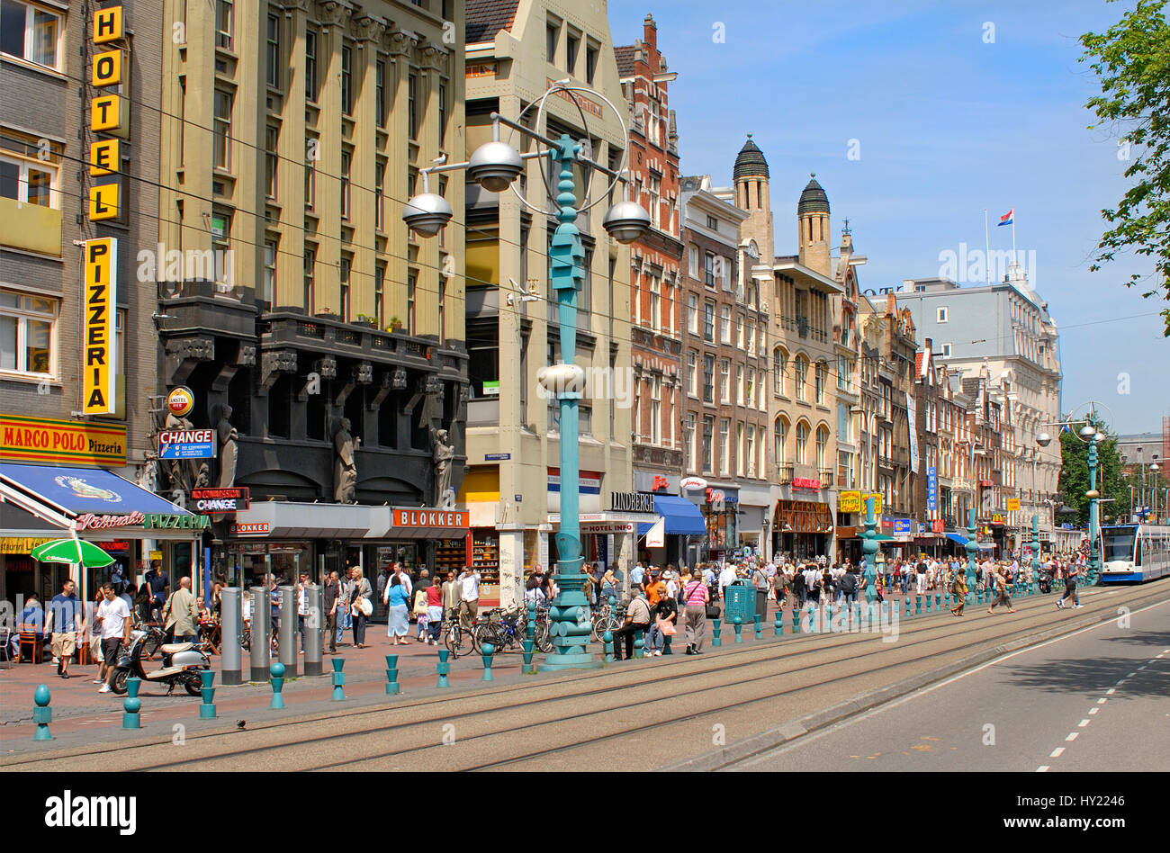 Image of the Damrak shopping street in the inner city of Amsterdam, Holland. Stock Photo