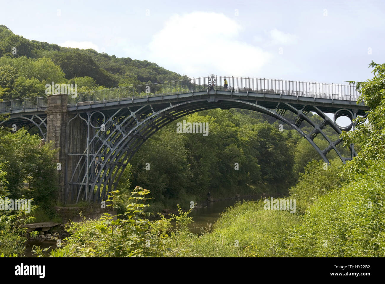 The Iron Bridge crosses the River Severn at the Ironbridge Gorge, by the village of Ironbridge, in Shropshire, England. It was the first arch bridge i Stock Photo