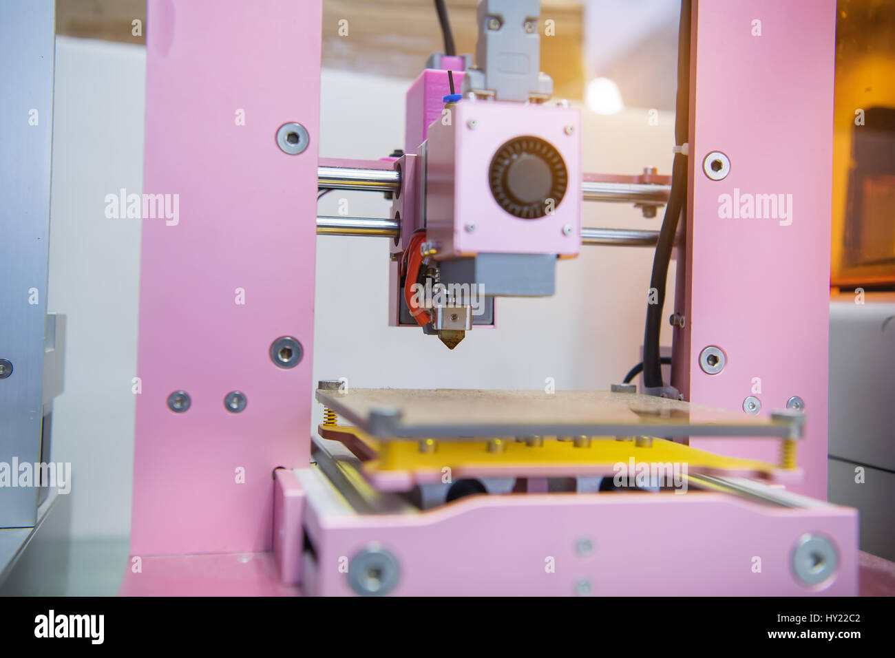 3D printer on a pink background Stock Photo
