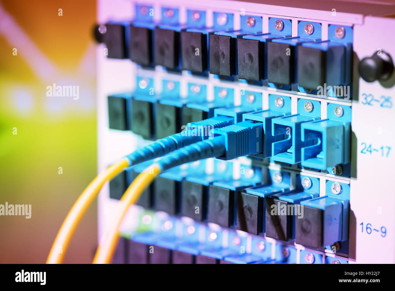 fiber optic telecommunication cables on blur background Stock Photo
