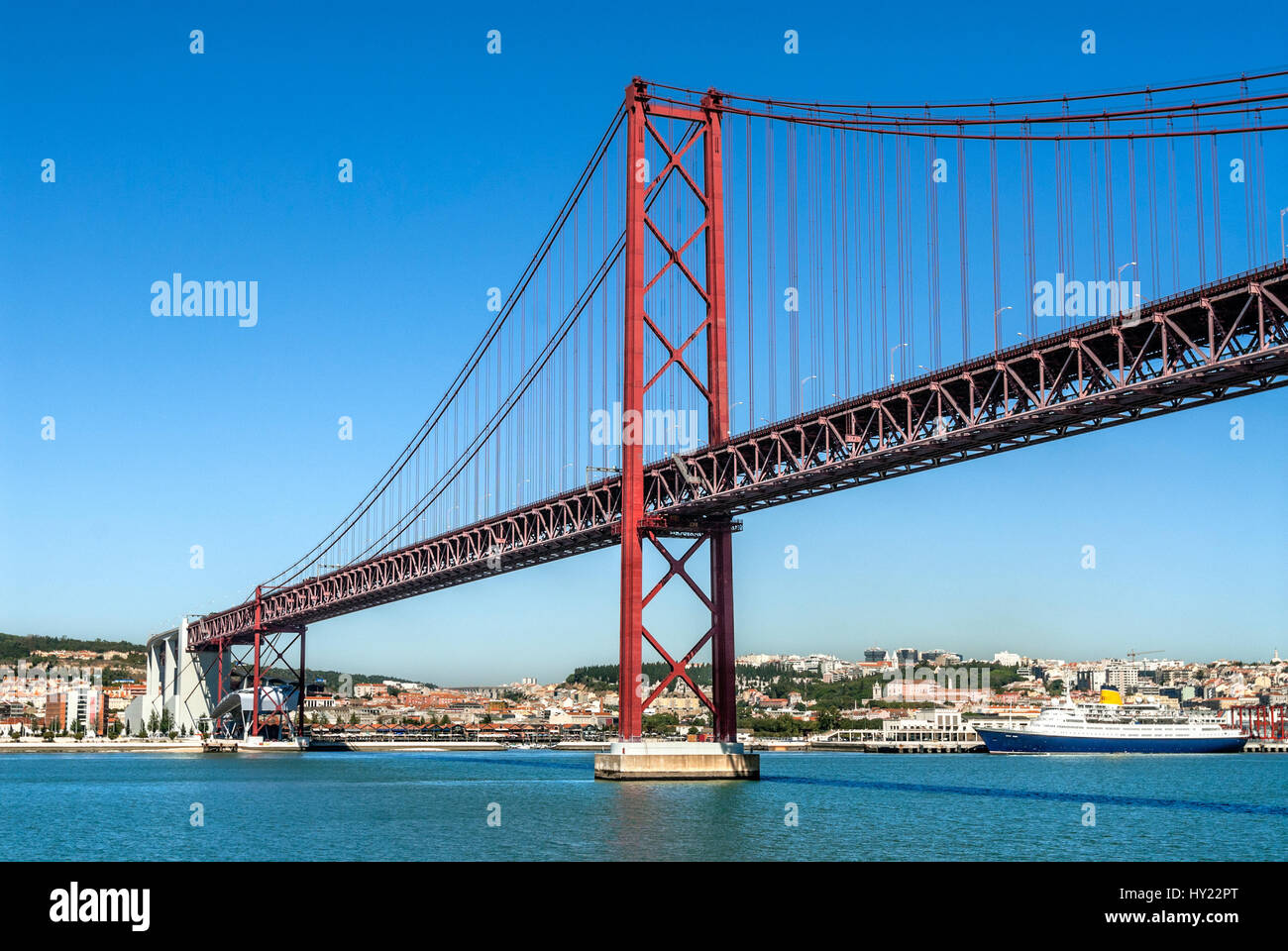 Suspension bridge Ponte 25 de Abril accross the River Tejo, Lisbon; Portugal Stock Photo