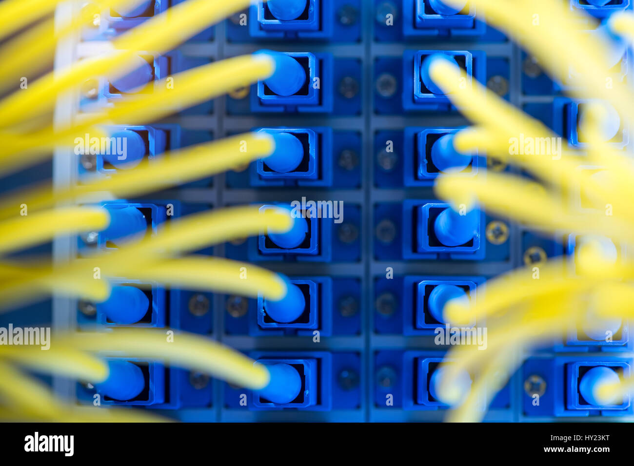 fiber optic telecommunication cables on blur background Stock Photo