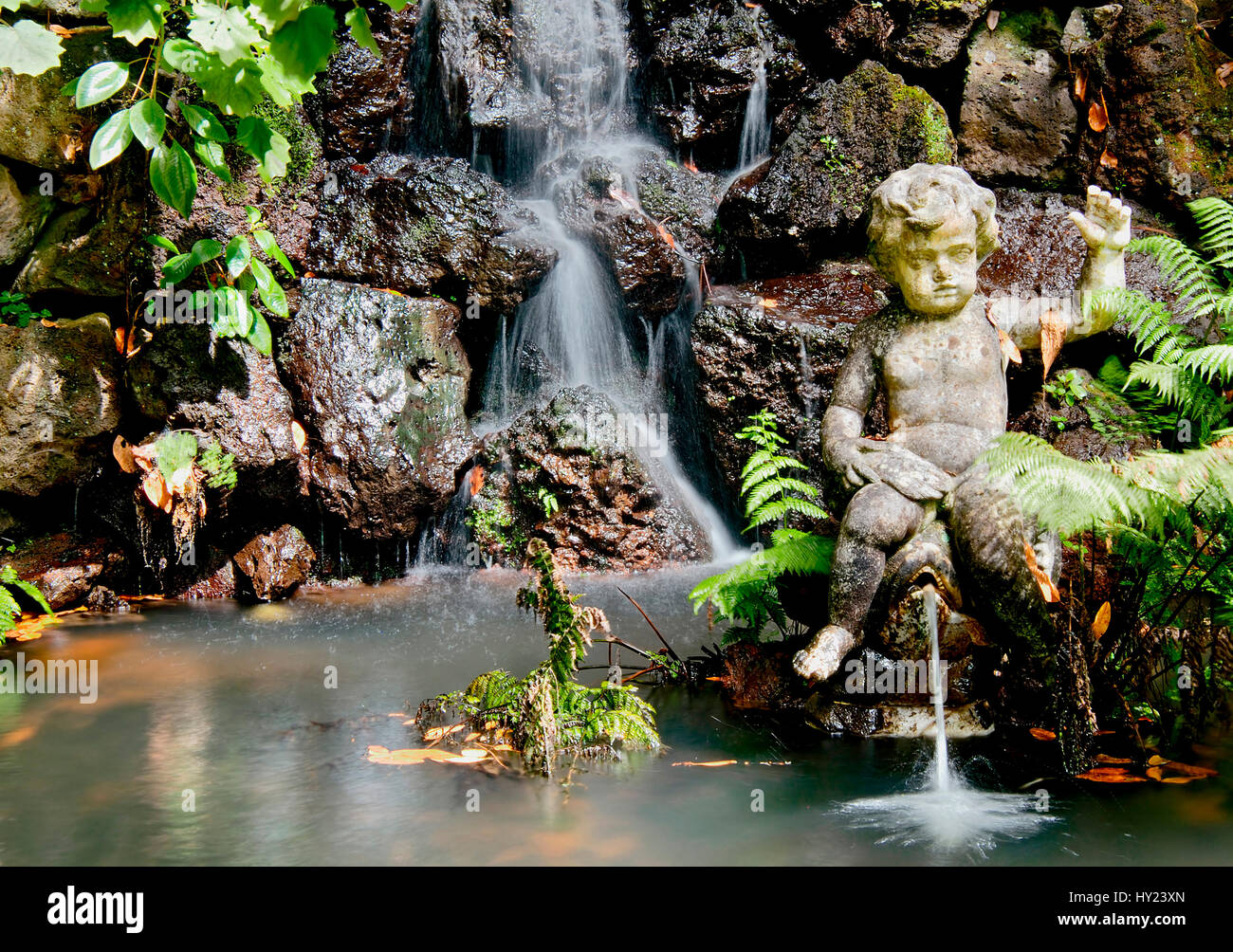 This stock photo shows a romantic fountain at the famous Monte Palace Garden in Funchal on Madeira, Portugal. Stock Photo