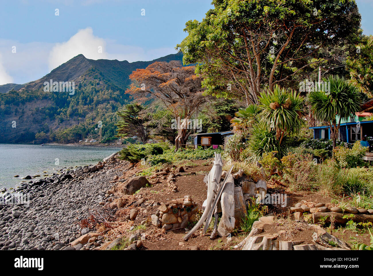 Image of the coast line and a house at the settlement on Robinson Crusoe Island, formerly known as Juan Fernandez, in Chile. Stock Photo