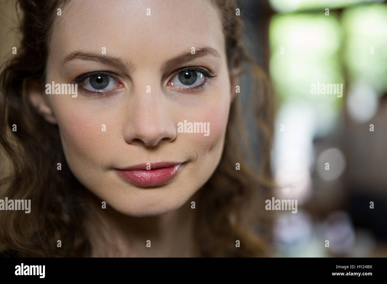 Portrait of beautiful young woman in coffee shop Stock Photo - Alamy