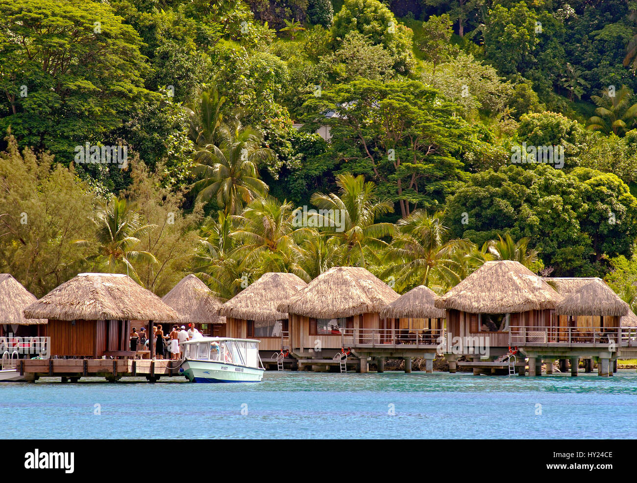Image of a romantic beach resort at a lagoon on Bora Bora Island, French Polynesia. Stock Photo