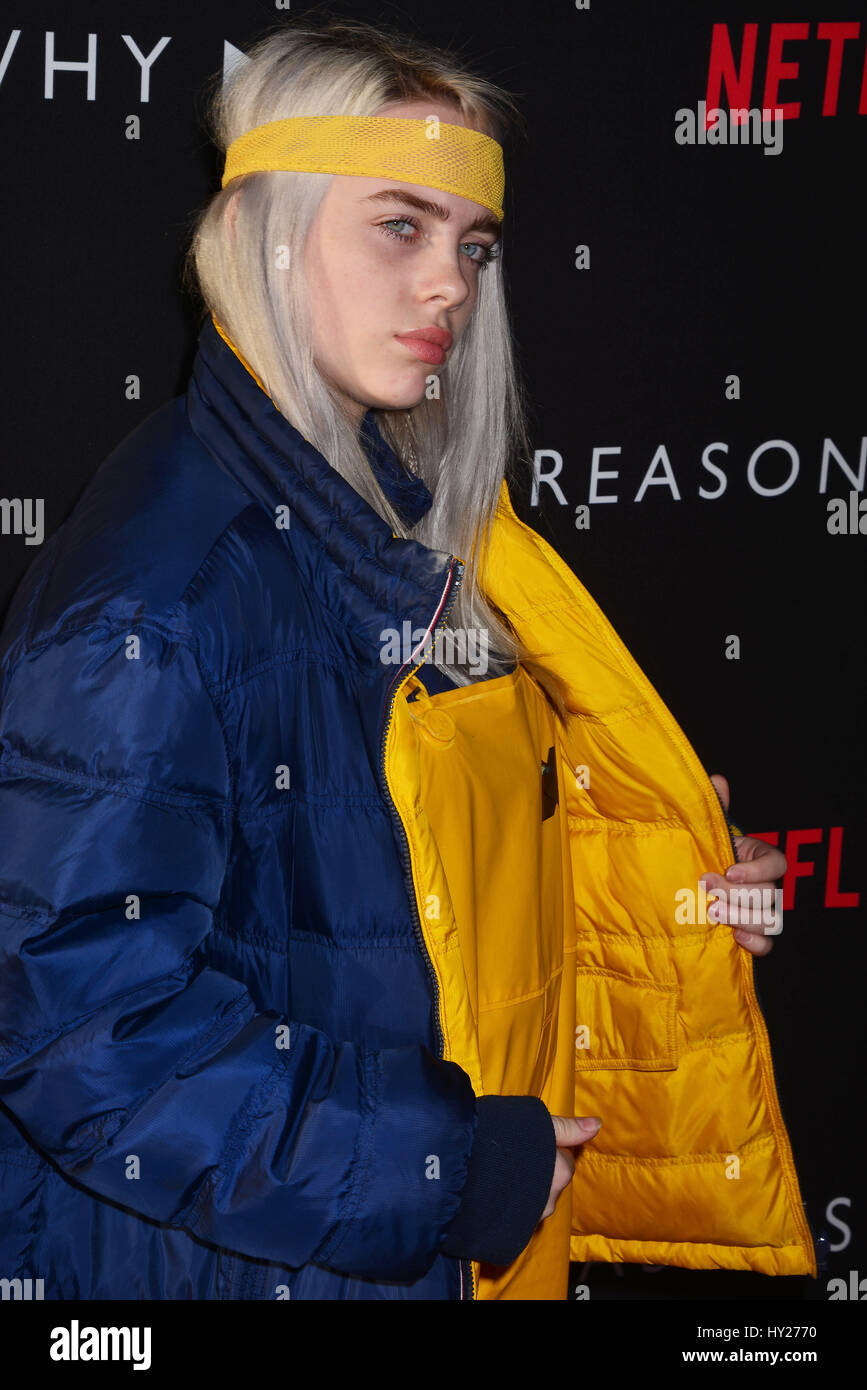 Billie Eilish attend the Premiere of Netflix's '13 Reasons Why' at Paramount Pictures on March 30, 2017 in Los Angeles, California. Stock Photo