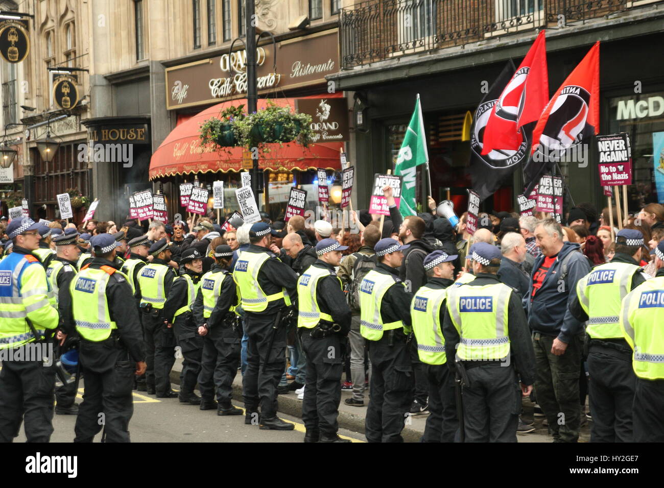 London, UK. April 1st, 2017. The anti-racism demo is surrounded by police in Whitehall. Far right groups Britain First and the English Defence League (EDL) Hold a rally in Whitehall, drawing on the recent terrorist attack in nearby Westminster as a justification. A counter 'unity demo' is held by Unite against Facism (UAF). Credit: Roland Ravenhill/Alamy Live News Stock Photo