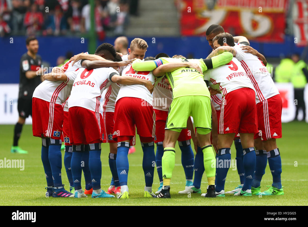 Hamburg's team forms a circle before the Bundesliga soccer match