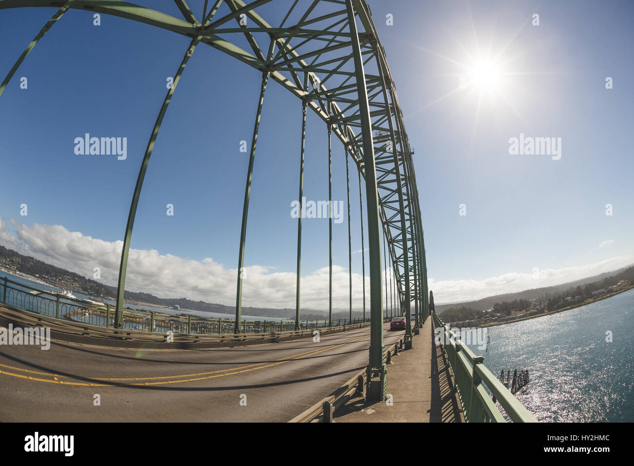 Yaquina Bay Bridge in Newport, Oregon, USA. Sunny summer day on the Pacific Ocean at the famous bridge commonly called Newport Bridge. Stock Photo