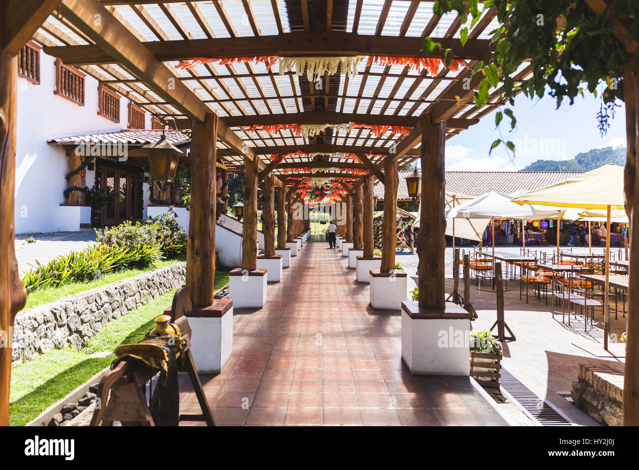 Large, beautiful covered patio in rural Guatemalan town. Sunny day setting. Stock Photo