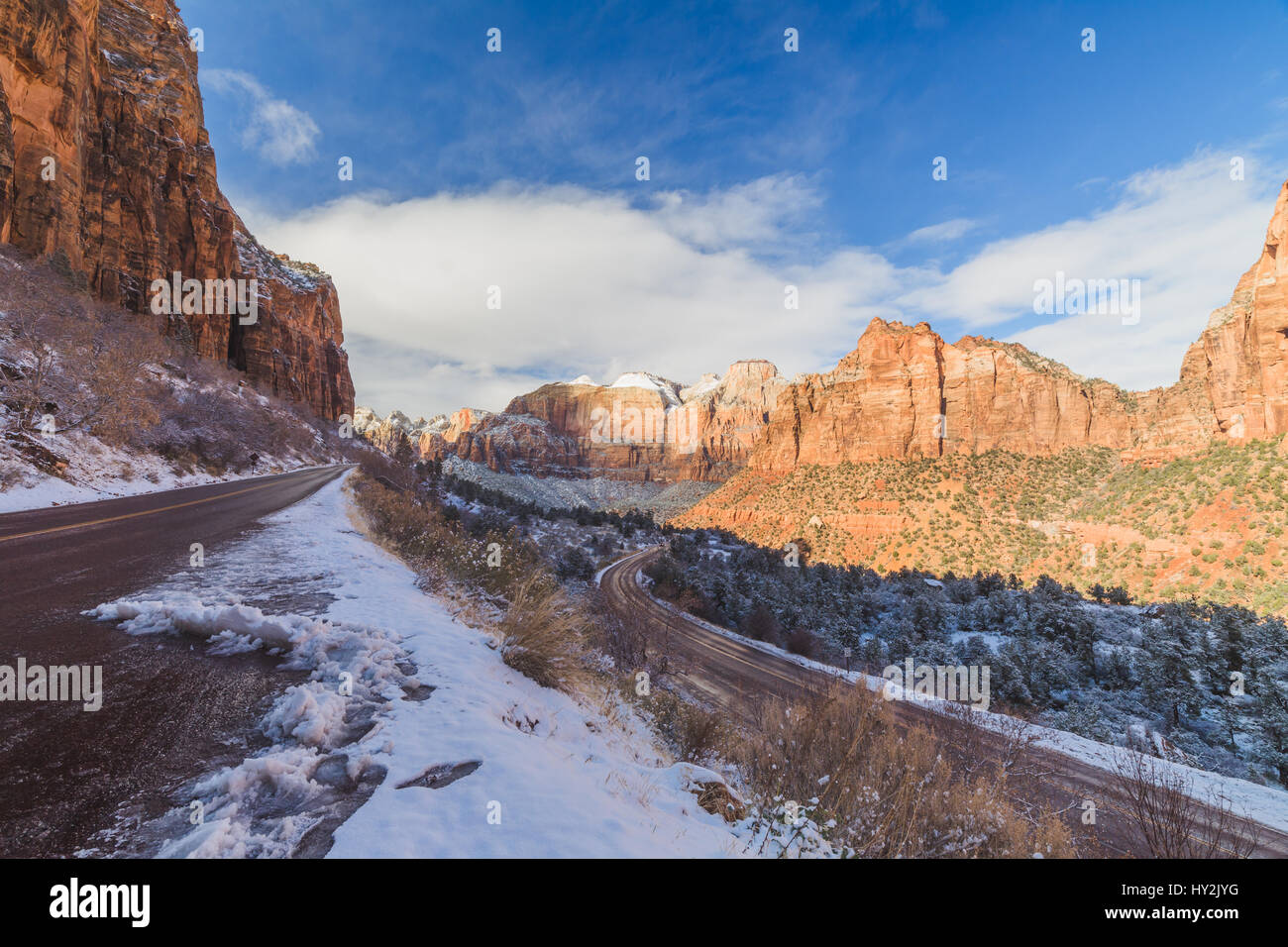 Snowy roads and blue skies at Zion National Park in southwest Utah, USA. Stock Photo