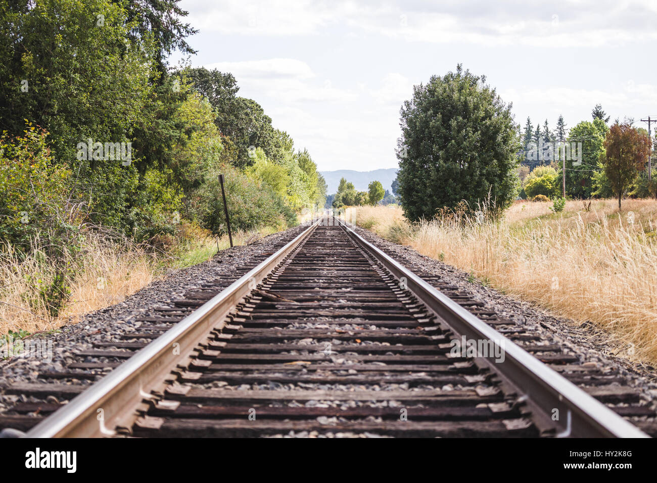 Wood and steel train tracks in a rural area of Oregon, USA. Stock Photo