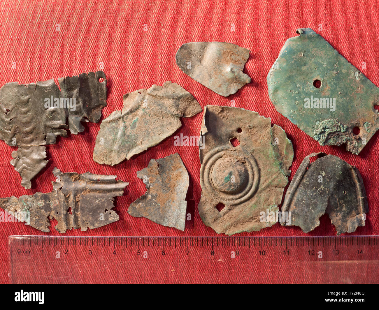 A selection of fragments of roman & Celtic shield votive offerings. Stock Photo
