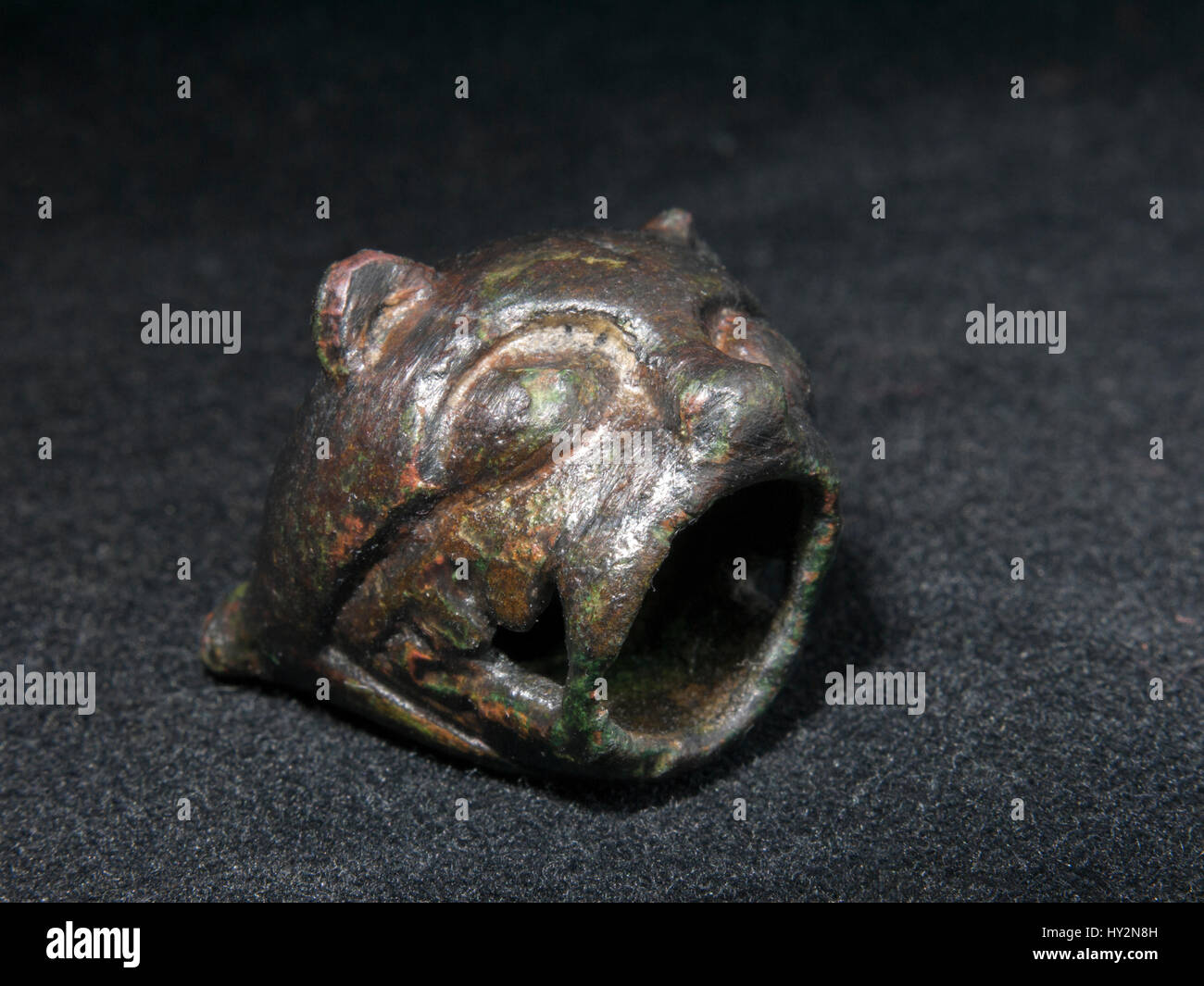 12th - 13th century copper bronze gaping mouth beast buckle. Stock Photo