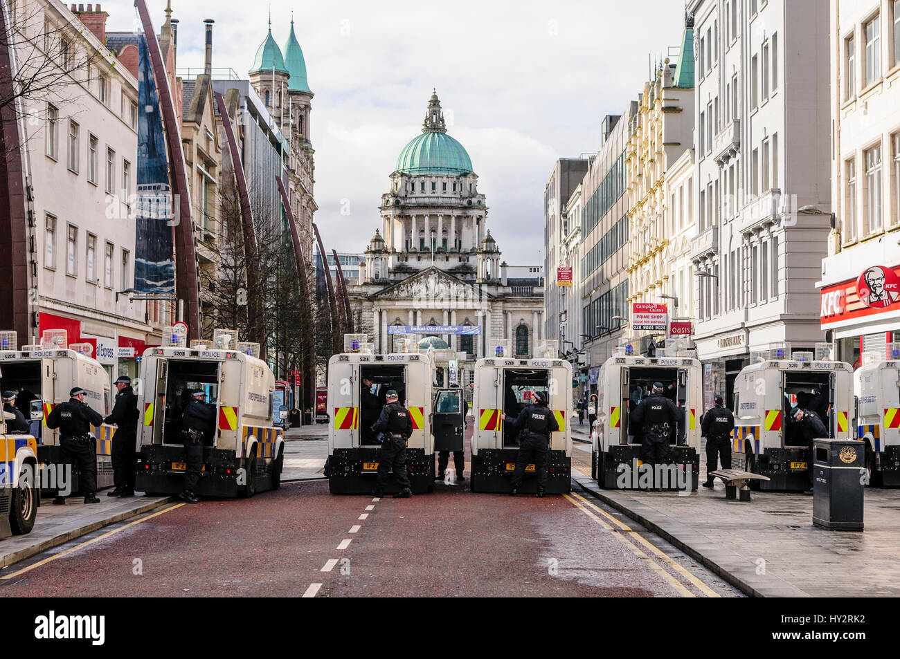 BELFAST, NORTHERN IRELAND: APR 24 2016 - A large number of PSNI Police officers and armoured Landrovers prevent people proceeding up Donegal Place in advance of a Republican Parade passing through Belfast City Centre to commemorate the 100th anniversary of the Irish Easter Rising. Stock Photo