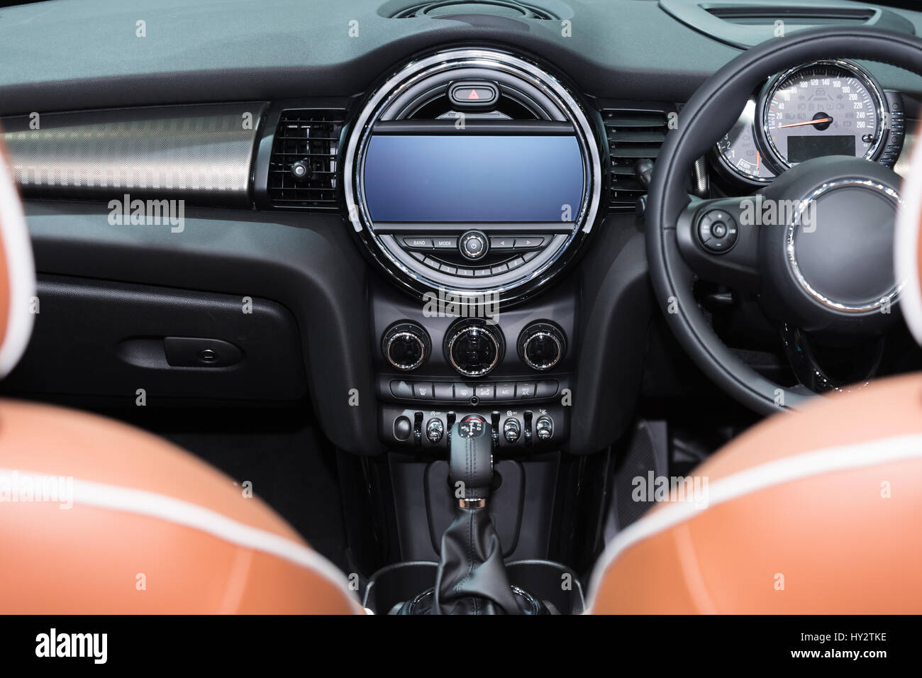 Interior view of car. Modern technology car dashboard, radio and aircondition control button. Stock Photo