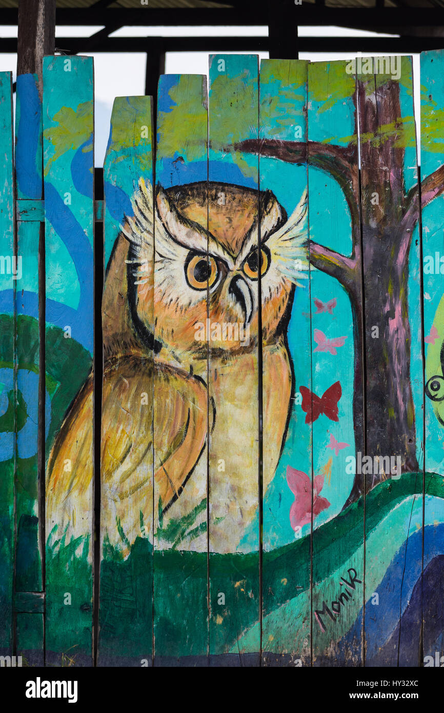 A hand-painted picture of Long-whiskered Owlet on the fence, promoting the special, highly endangered species living in this area of Northern Peru. Stock Photo