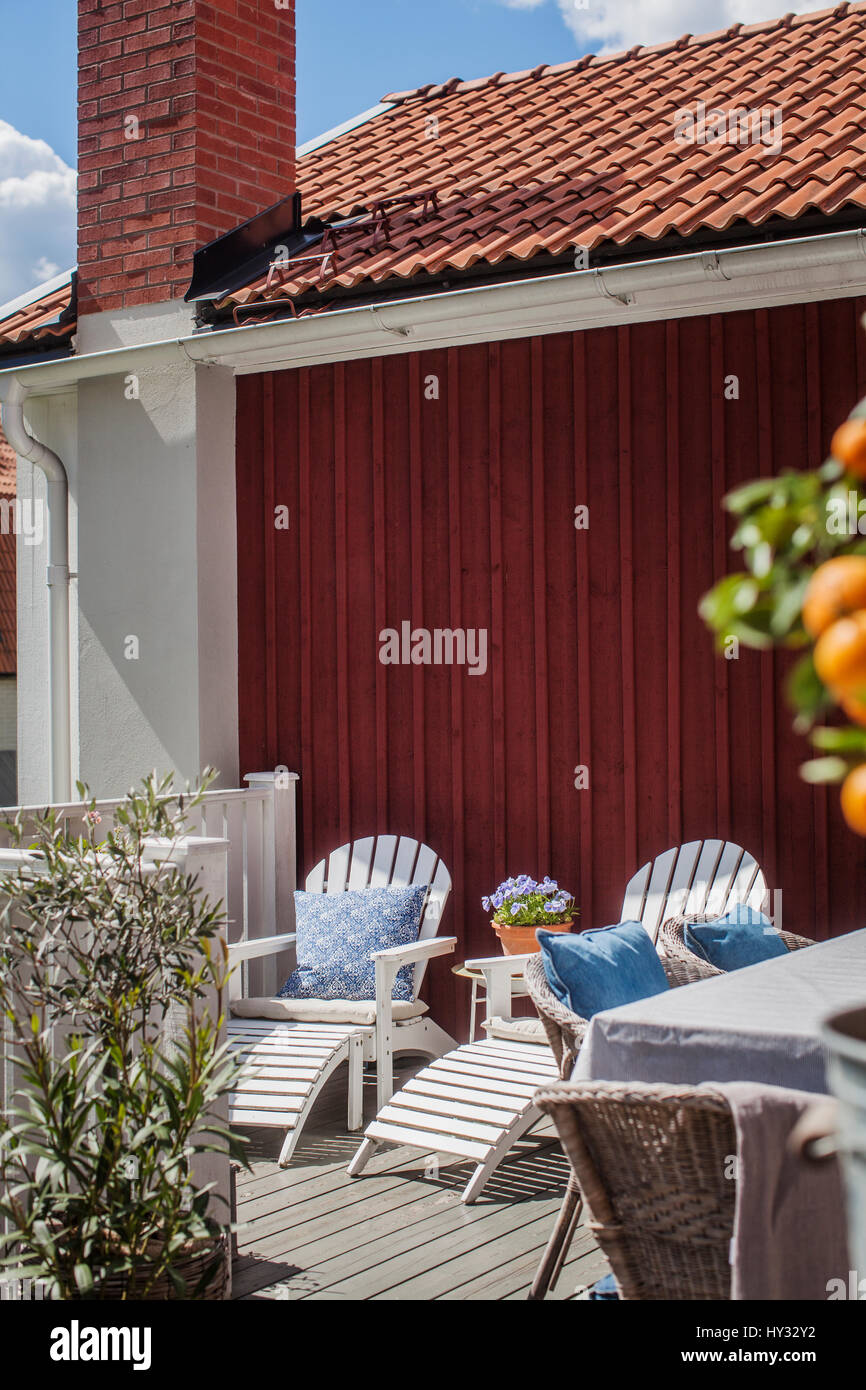 Sweden, Vastmanland, Vasteras, Sunloungers on patio Stock Photo