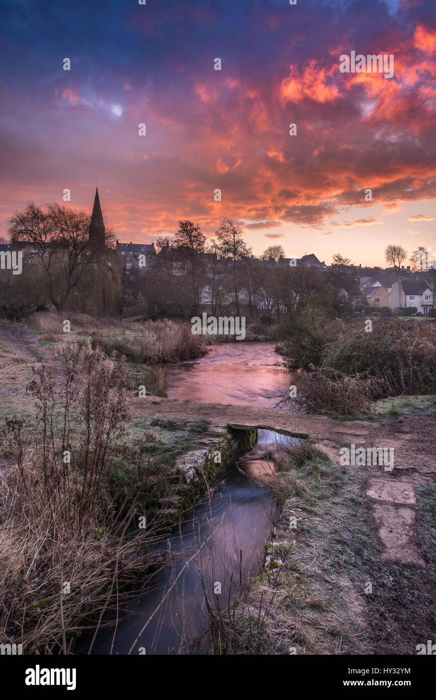 With temperatures dropping to minus five over night , clouds slowly roll in over the Wiltshire hillside town of Malmesbury at dawn. Stock Photo