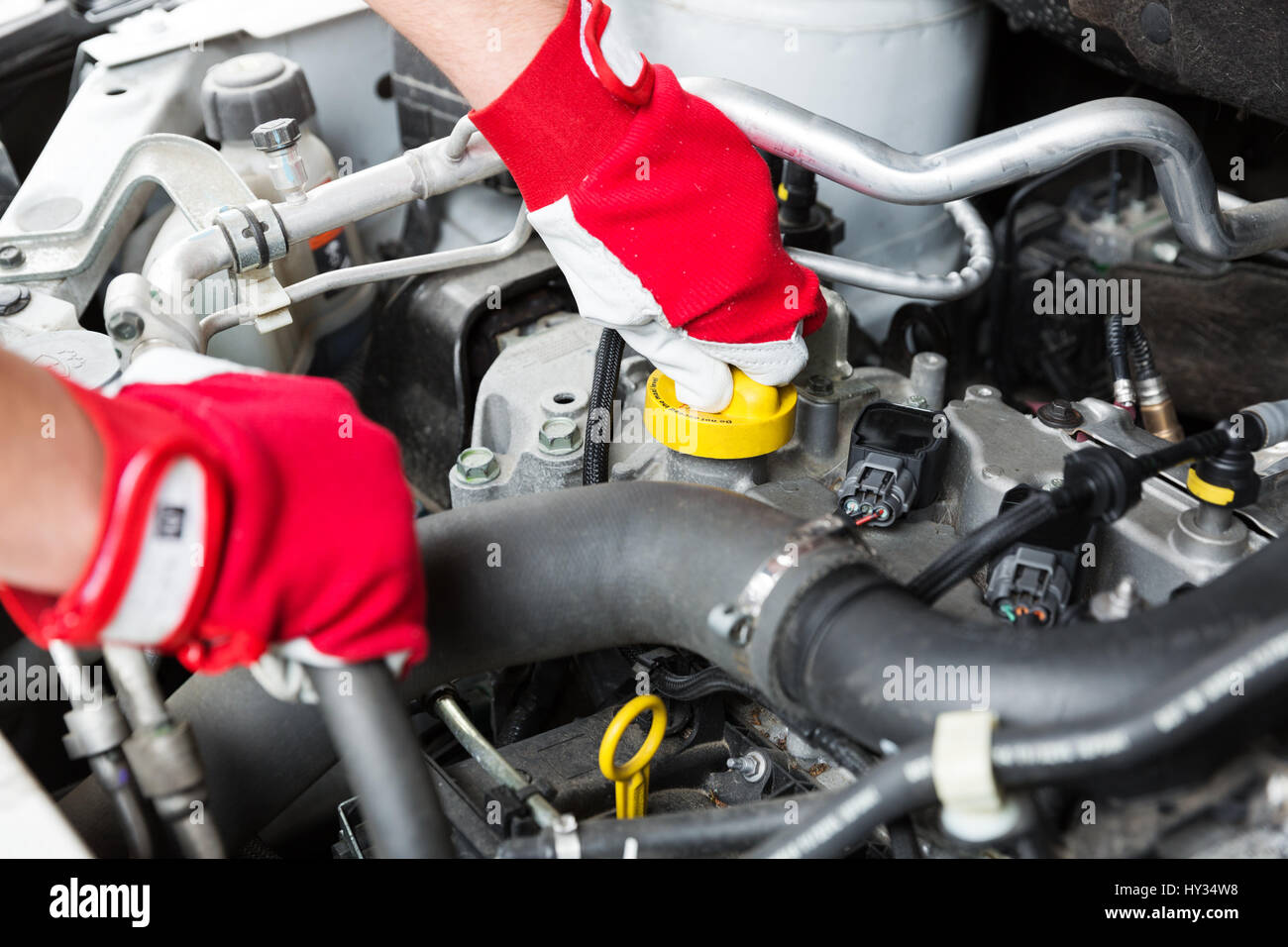 car maintenance - mechanic check vehicle engine Stock Photo