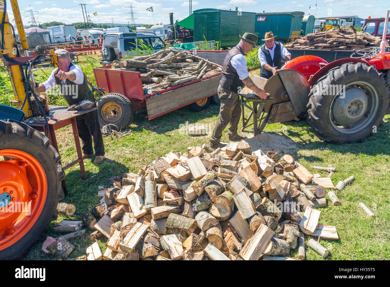 A demonstration of log splitting using tractors at the 2016 Norton Fitzwarren Steam & Vintage Vehicle Rally, Somerset Stock Photo