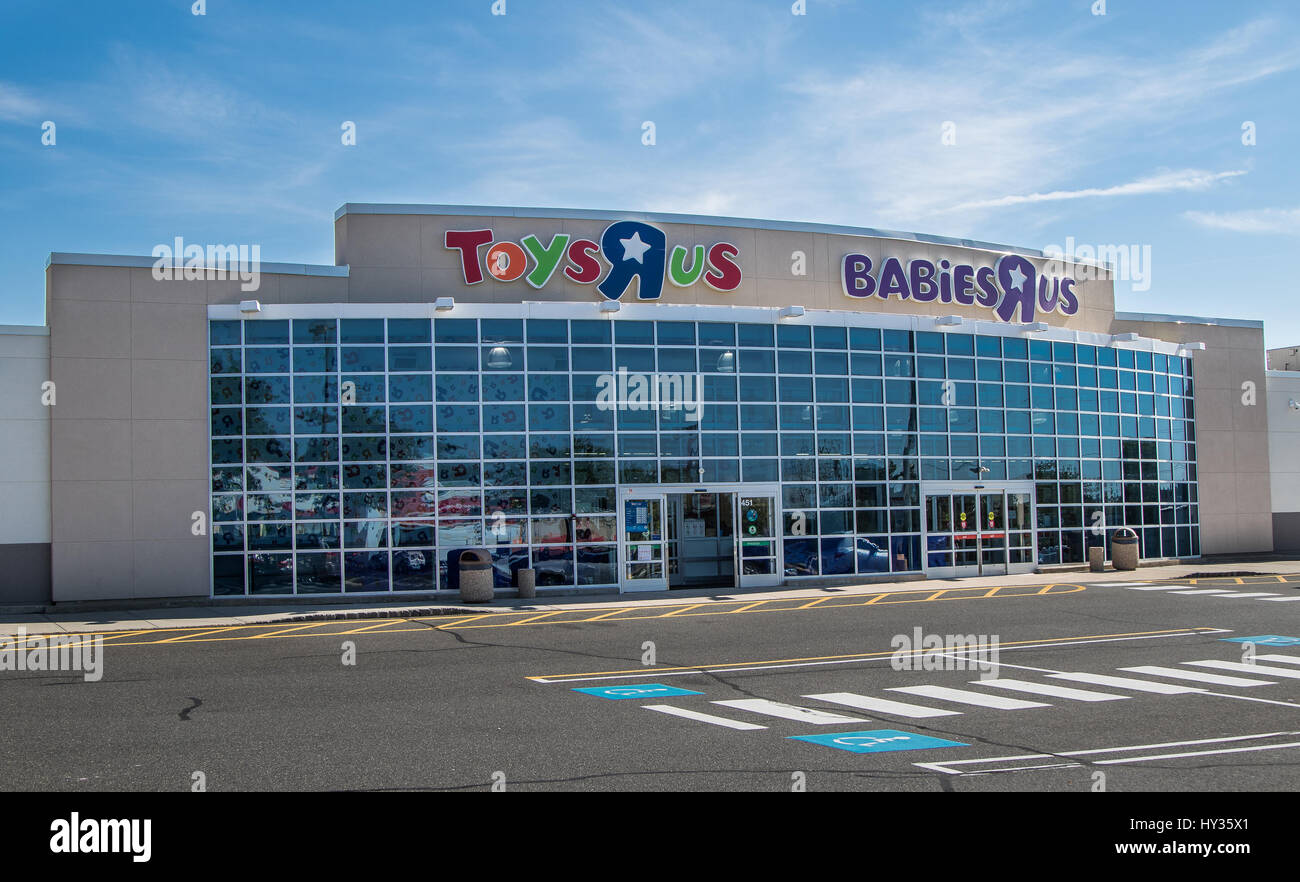 A Toys Are Us and Babies Are Us join store and a parking lot in front