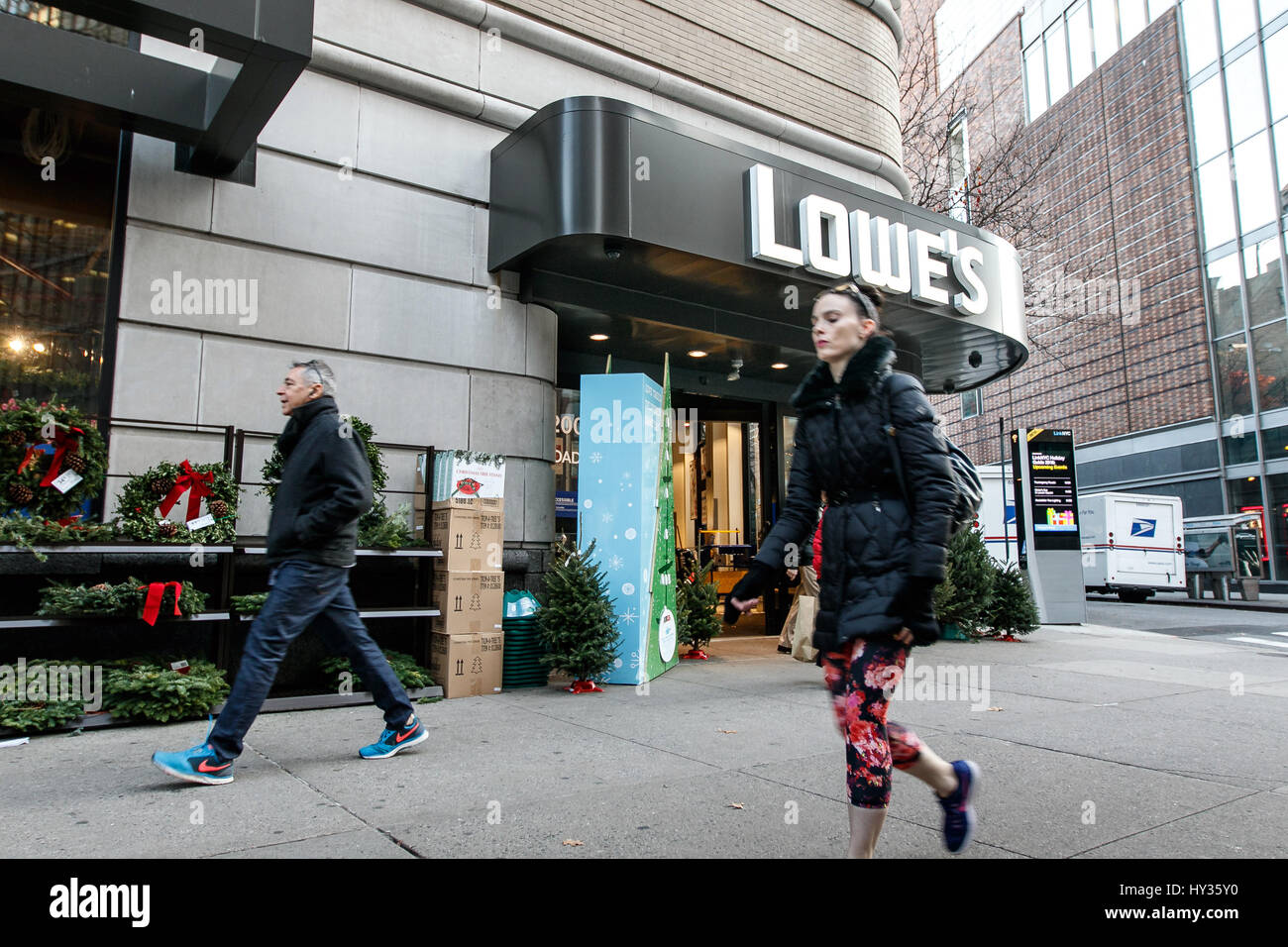 New York, November 28, 2016: People walk by the entrance to a Lowe's home improvement store on Upper West Side. Stock Photo